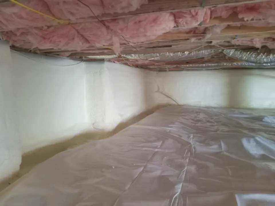 Crawl space encapsulation with closed-cell spray foam for Roof Waterproofing in University